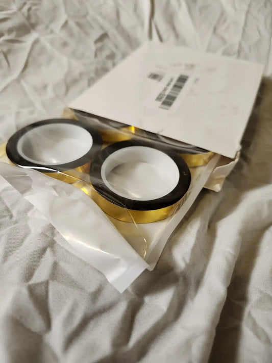 Gold Metallic Mirror Tape - 4pk. Gold metallic mirror tape. 4 rolls, each roll is approximately 22 yards long