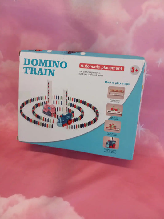 Kids Domino Train - Battery operated train that automatically sets a line of dominos to make falling domino tracks. Includes 1 train (Morandi Blue) with lights and sound, 2 loaders, and 180 dominos